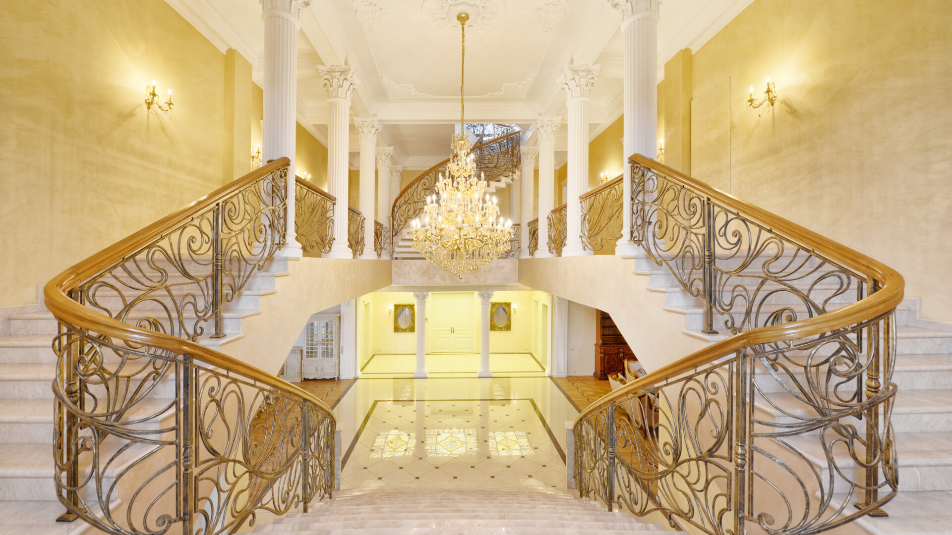 luxury-grand-staircase-with-chandelier-and-classical-columns